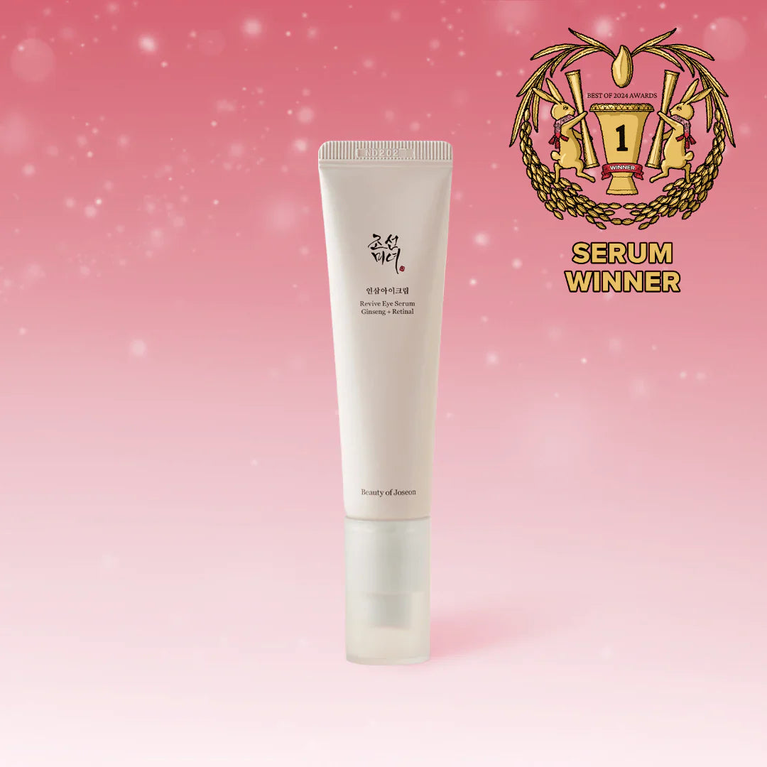 A bottle of Revive Eye Serum with a pink background, highlighting the product with sparkles and a seal indicating a 'Serum Winner' award.