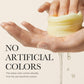 Hand holding a bar of soap with a natural yellow color, emphasizing the use of sea buckthorn extract.