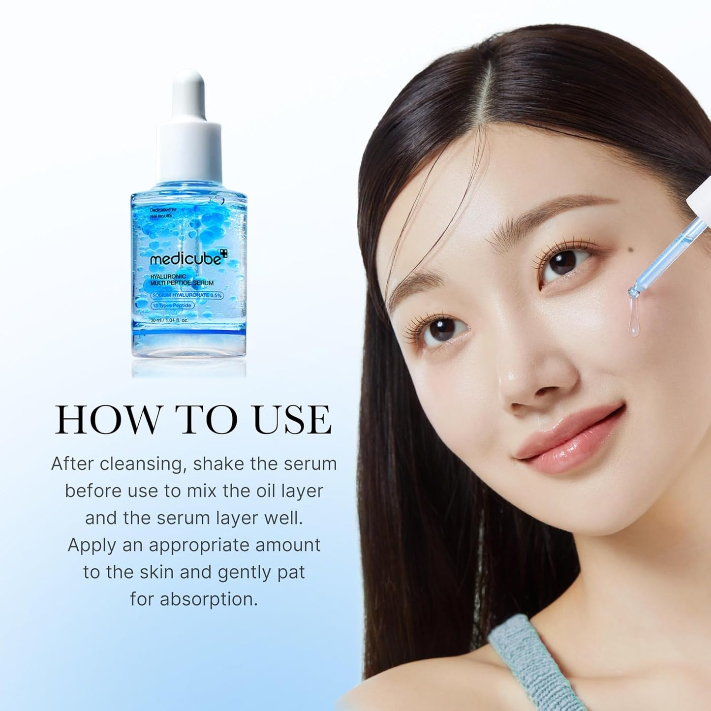 Woman applying medicube skincare product with Medicube serum bottle on a white background